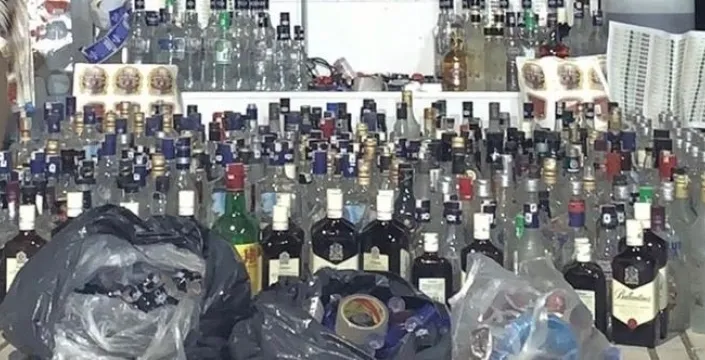 Yılbaşı öncesi büyük darbe: İnegöl'de kaçak alkol ve sigara deposuna baskın!
