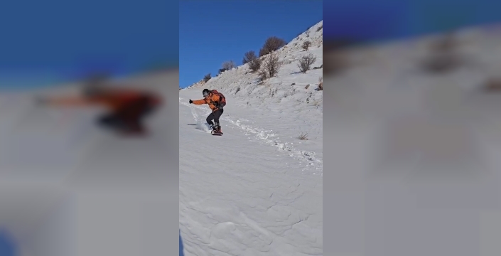 Diş hekimi, zirveye tırmandıktan sonra snowboard ile iniş yaptı